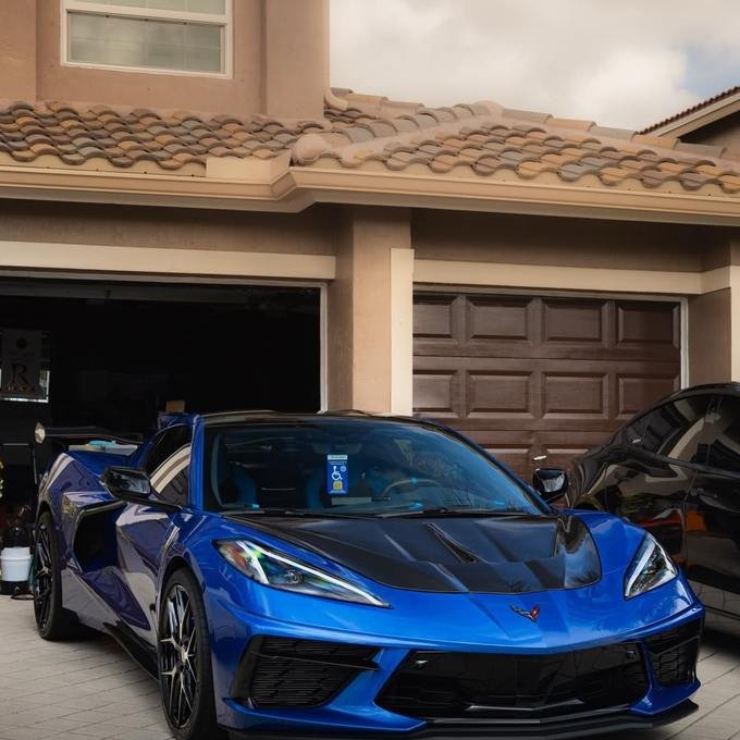 Blue Corvette with a deep glossy finish after detailing