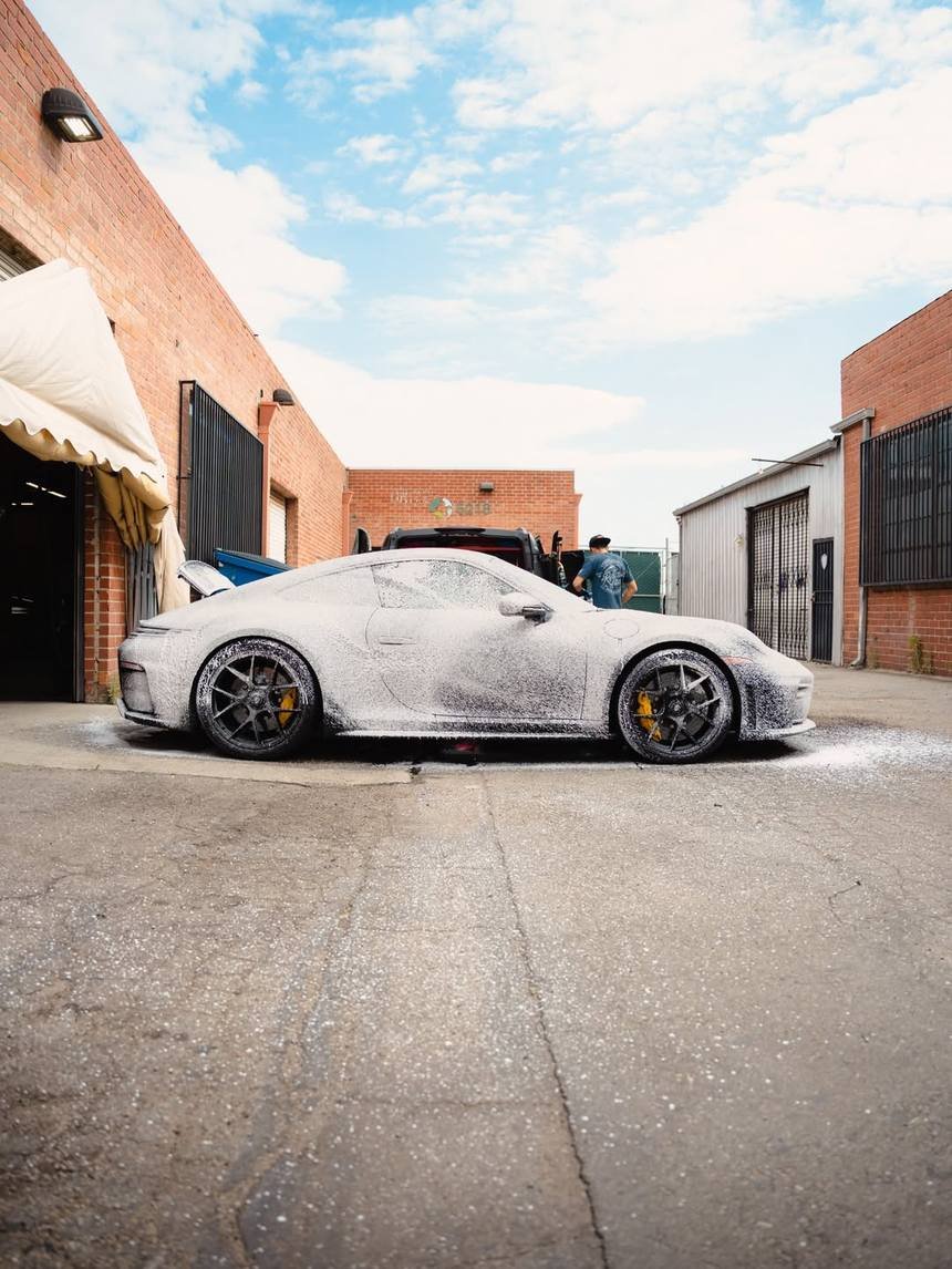 Foam pre-soak on a car during exterior detailing