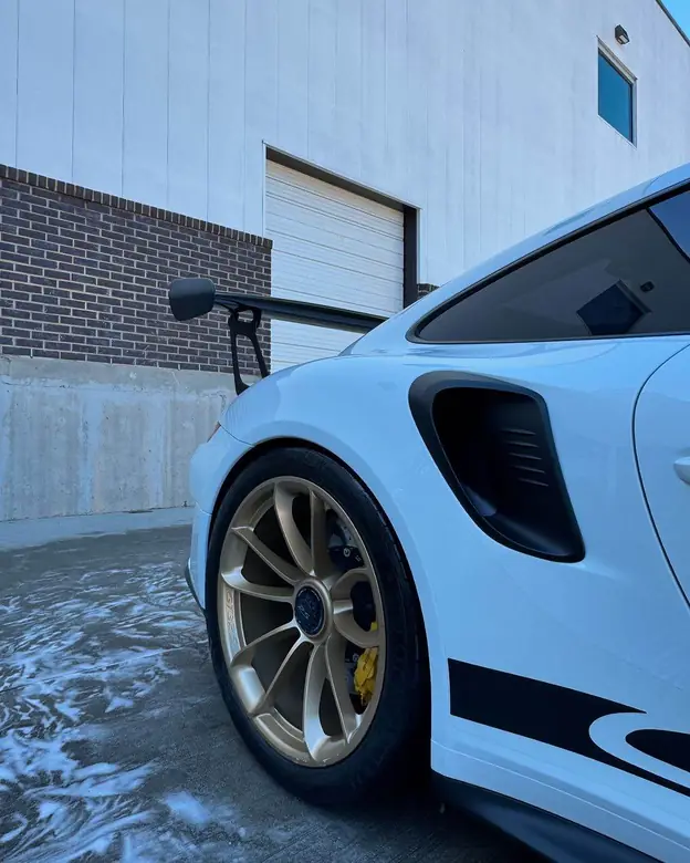 Porsche 911 GT3 RS gold wheel and brake detail
