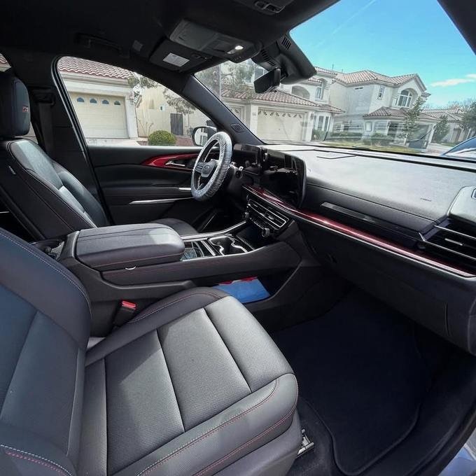 Spotless leather interior with red stitching after a full detail