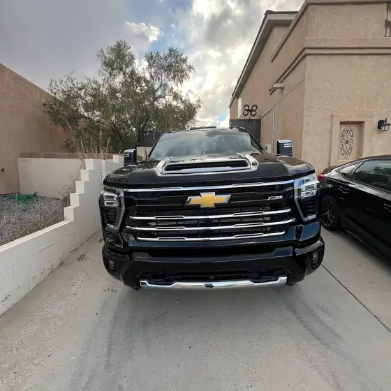 Black Chevrolet truck front view after a ceramic coating
