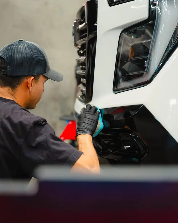 Marrufo Detailing team member detailing the front of a truck