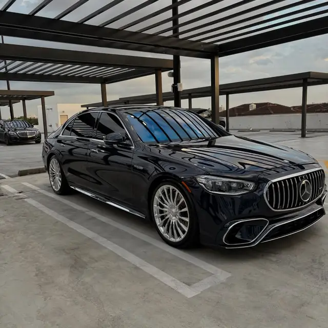 Dark blue Mercedes-AMG S63 detailed to a glossy finish