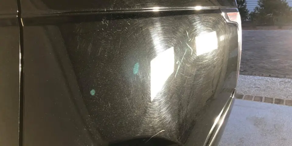 Black panel with heavy swirls