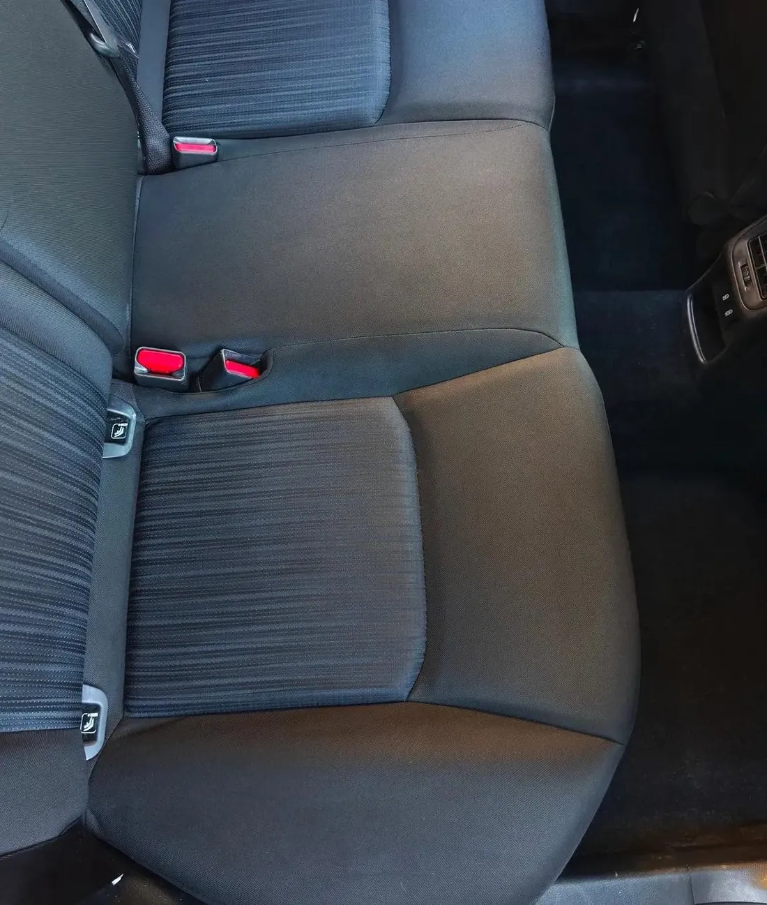 Cloth back seat after the detail, stains gone