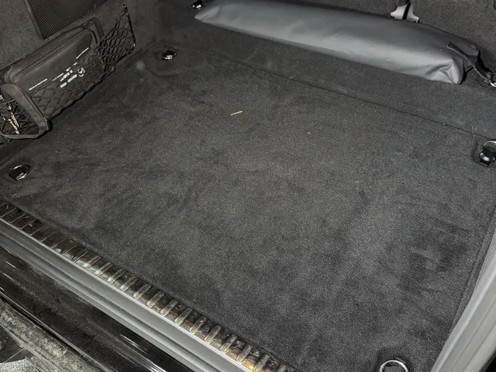 Trunk carpet before, dirty