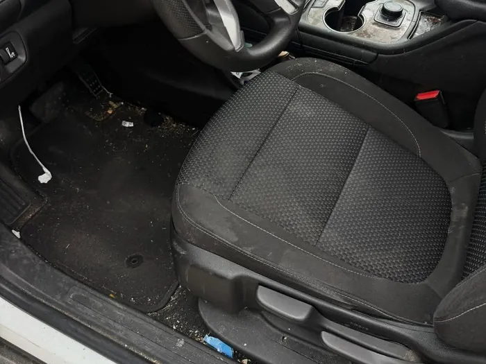Driver side before, trash on the floor and a dirty sill