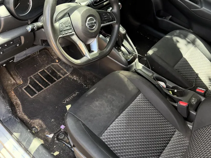 Front seat and floor before, dirty